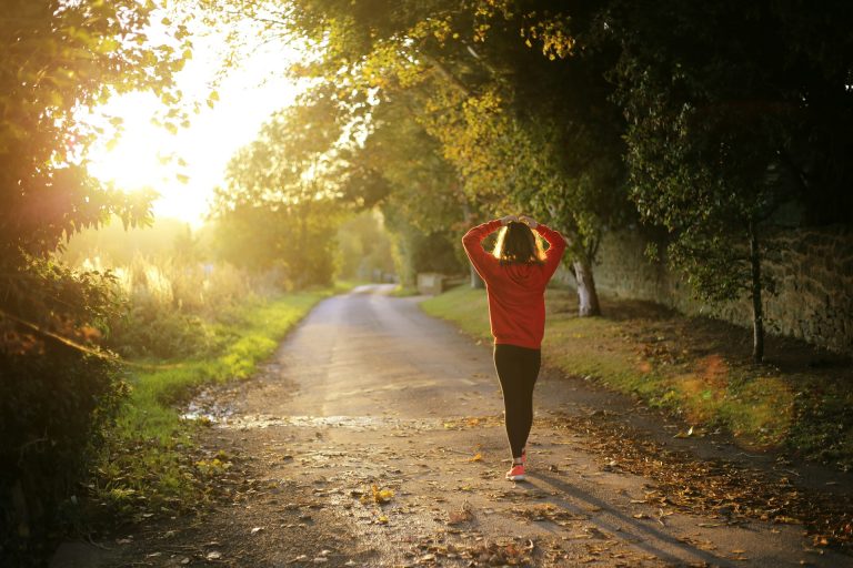 emma-simpson-mNGaaLeWEp0-unsplash Woman along road