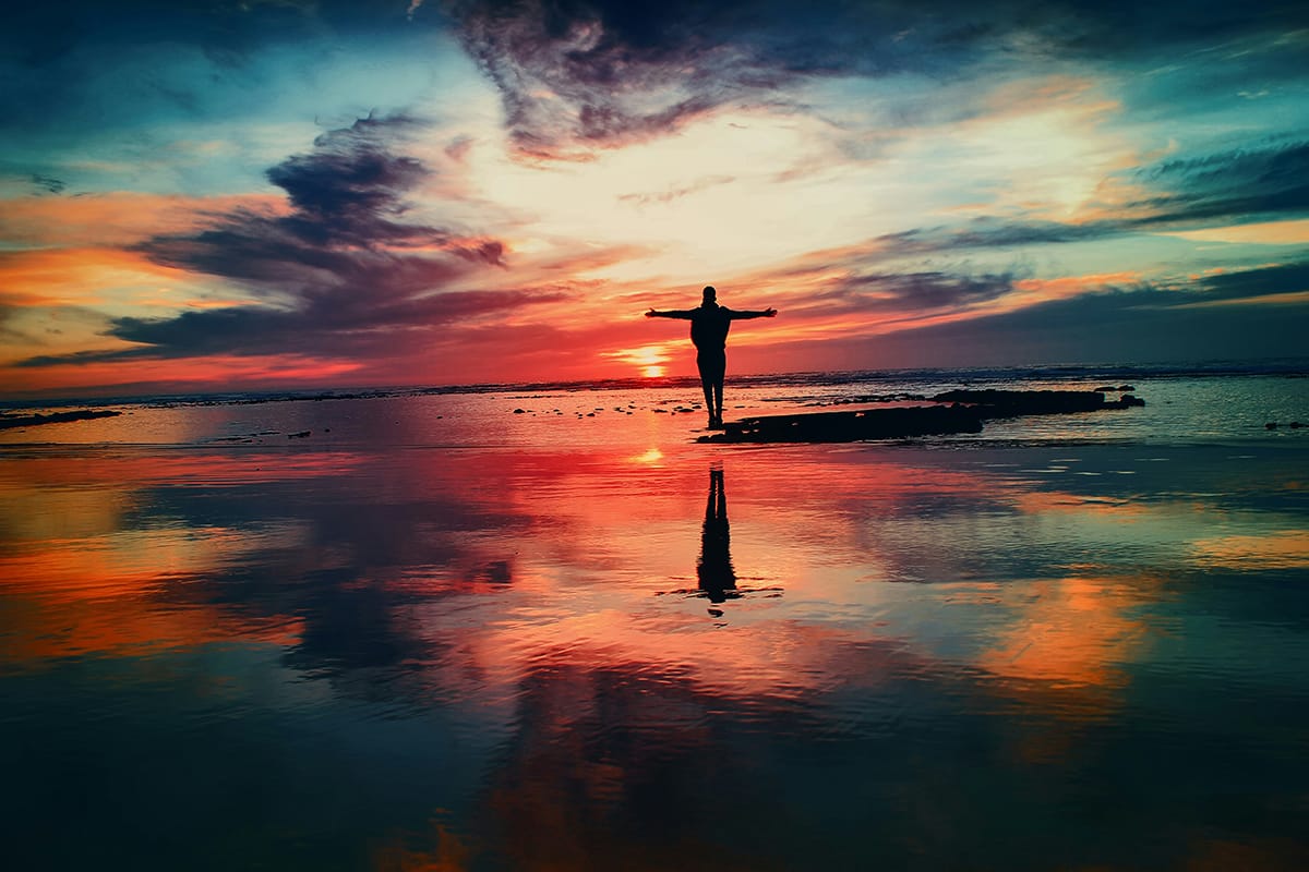 Man watching sunrise